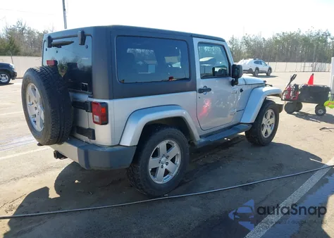 2011 Jeep Wrangler Sahara из США, поврежденный, VIN 1J4AA5D12BL522402